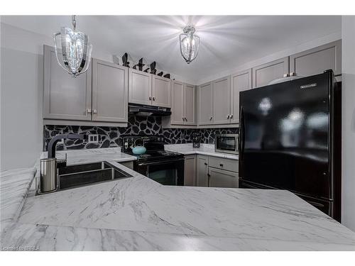 31 Irongate Drive, Paris, ON - Indoor Photo Showing Kitchen With Double Sink