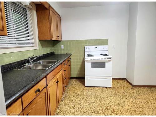 Upper-131 Baldwin Avenue, Brantford, ON - Indoor Photo Showing Kitchen With Double Sink