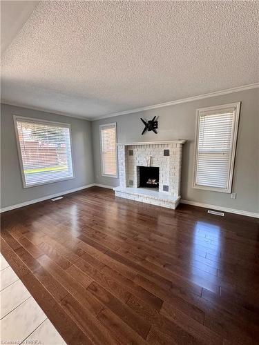 24 Blackfriar Lane, Brantford, ON - Indoor Photo Showing Living Room With Fireplace