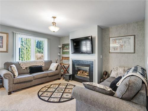 3 Johnson Crescent, Simcoe, ON - Indoor Photo Showing Living Room With Fireplace