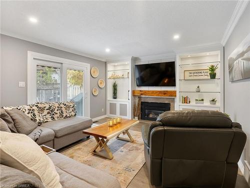 37 Dorchester Avenue, Brantford, ON - Indoor Photo Showing Living Room With Fireplace