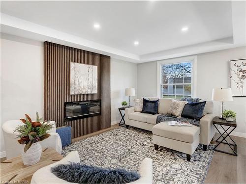 52 Fieldgate Drive, Brantford, ON - Indoor Photo Showing Living Room With Fireplace