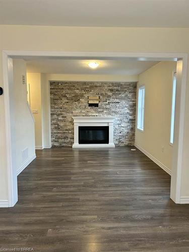 64-143 Ridge Road, Cambridge, ON - Indoor Photo Showing Living Room With Fireplace