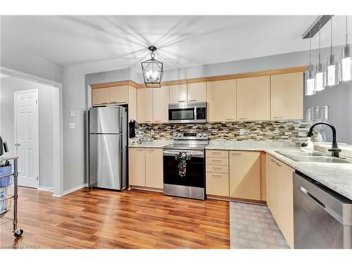 4-220 Blackburn Drive, Brantford, ON - Indoor Photo Showing Kitchen With Stainless Steel Kitchen With Double Sink With Upgraded Kitchen