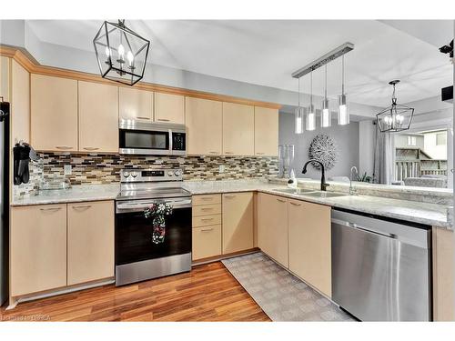 4-220 Blackburn Drive, Brantford, ON - Indoor Photo Showing Kitchen With Stainless Steel Kitchen With Double Sink With Upgraded Kitchen