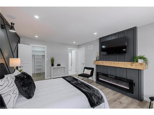 2 Keeler Place, Brantford, ON - Indoor Photo Showing Bedroom With Fireplace