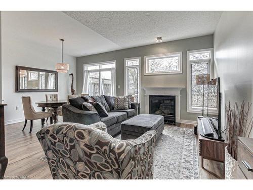 185-2025 Meadowgate Boulevard, London, ON - Indoor Photo Showing Living Room With Fireplace