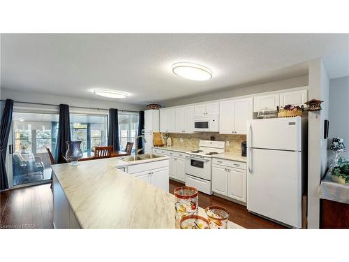 21 Long Point Boulevard, Port Rowan, ON - Indoor Photo Showing Kitchen With Double Sink