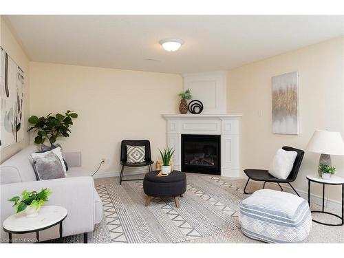 1-25 Cobden Court, Brantford, ON - Indoor Photo Showing Living Room With Fireplace