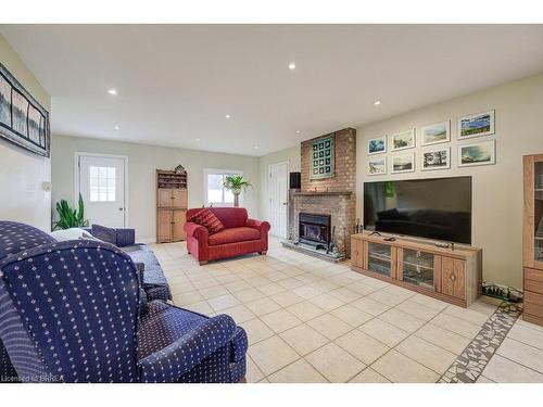 955309 Canning Road, Canning, ON - Indoor Photo Showing Living Room With Fireplace