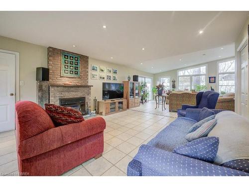 955309 Canning Road, Canning, ON - Indoor Photo Showing Living Room With Fireplace