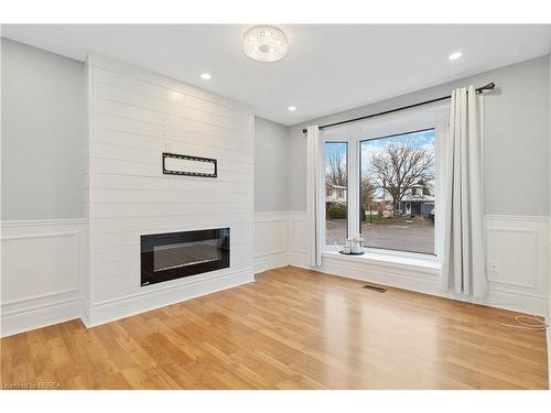 7 Normandy Place, Brantford, ON - Indoor Photo Showing Other Room With Fireplace