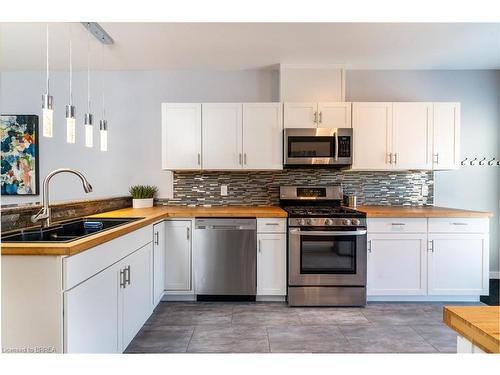 608 Upper James Street, Hamilton, ON - Indoor Photo Showing Kitchen With Double Sink