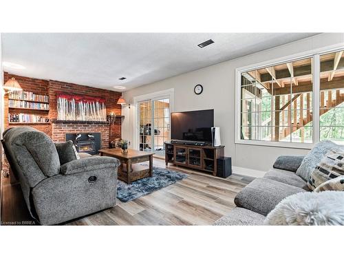 12 Campbell Farm Road, Brantford, ON - Indoor Photo Showing Living Room With Fireplace