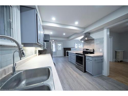 108 Colborne Street N, Simcoe, ON - Indoor Photo Showing Kitchen With Double Sink