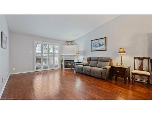 7-24 Griffiths Drive, Paris, ON - Indoor Photo Showing Living Room With Fireplace