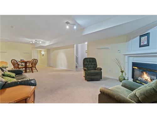 7-24 Griffiths Drive, Paris, ON - Indoor Photo Showing Living Room With Fireplace