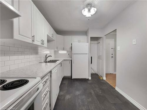 302-640 West Street, Brantford, ON - Indoor Photo Showing Kitchen With Double Sink