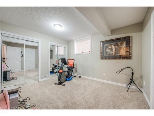 16 Mcguiness Drive, Brantford, ON - Indoor Photo Showing Gym Room