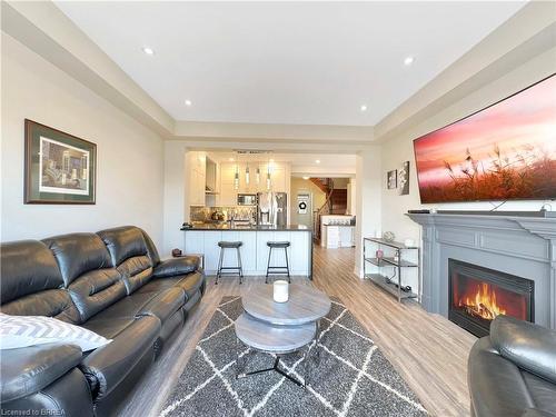 4148 Rawlins Common, Burlington, ON - Indoor Photo Showing Living Room With Fireplace