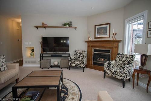 15 Burton Avenue, Mount Pleasant, ON - Indoor Photo Showing Living Room With Fireplace