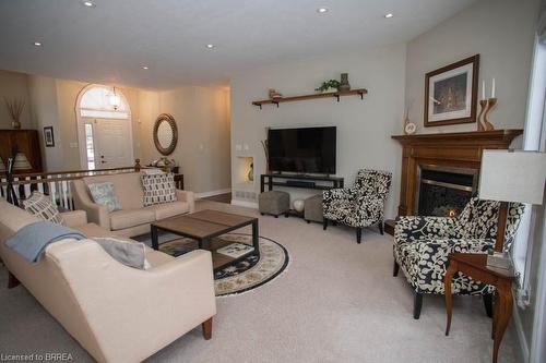 15 Burton Avenue, Mount Pleasant, ON - Indoor Photo Showing Living Room With Fireplace