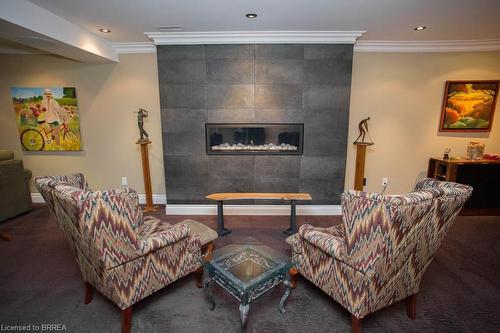 15 Burton Avenue, Mount Pleasant, ON - Indoor Photo Showing Other Room With Fireplace