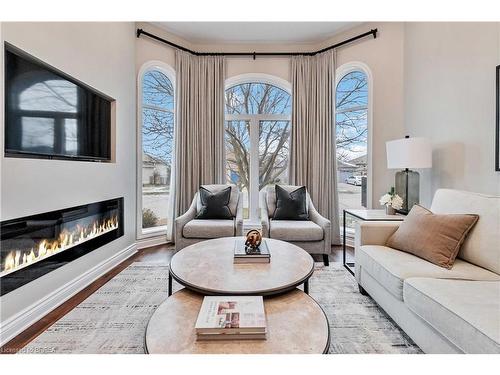 89 Court Drive, Paris, ON - Indoor Photo Showing Living Room With Fireplace