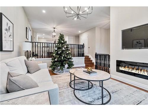 89 Court Drive, Paris, ON - Indoor Photo Showing Living Room With Fireplace