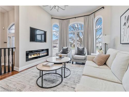 89 Court Drive, Paris, ON - Indoor Photo Showing Living Room With Fireplace