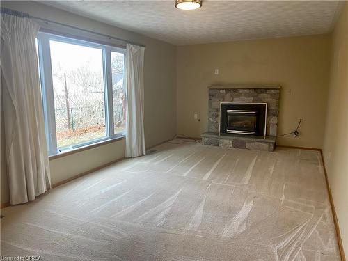 8 Sterling Street, Brantford, ON - Indoor Photo Showing Living Room With Fireplace