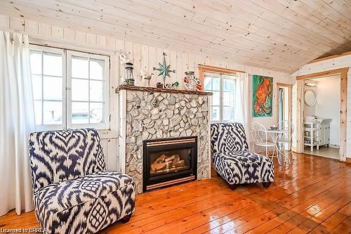 57 Erie Boulevard, Long Point, ON - Indoor Photo Showing Other Room With Fireplace