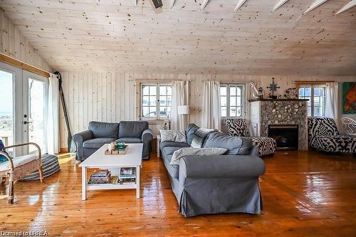 57 Erie Boulevard, Long Point, ON - Indoor Photo Showing Living Room With Fireplace