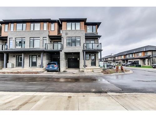 110-461 Blackburn Drive, Brantford, ON - Outdoor With Balcony With Facade