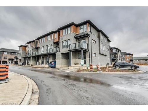 110-461 Blackburn Drive, Brantford, ON - Outdoor With Balcony With Facade