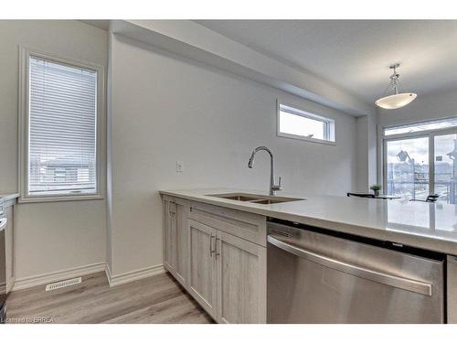 110-461 Blackburn Drive, Brantford, ON - Indoor Photo Showing Kitchen With Double Sink