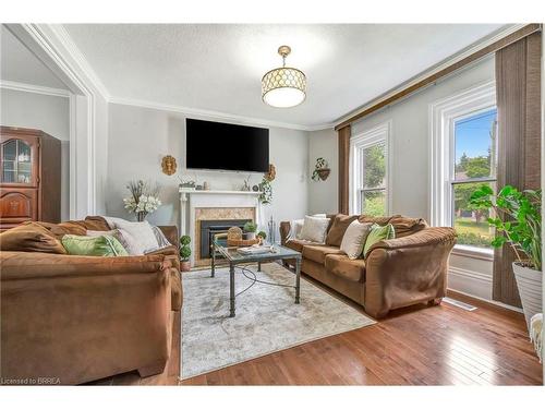 109 St Paul Avenue, Brantford, ON - Indoor Photo Showing Living Room With Fireplace