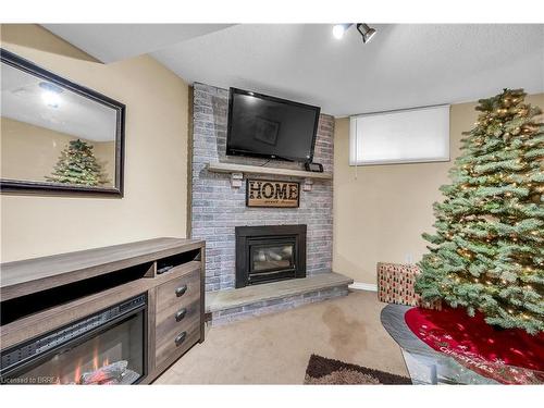 32 Kiev Boulevard, Brantford, ON - Indoor Photo Showing Living Room With Fireplace