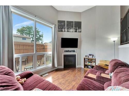 B-500 Grey Street, Brantford, ON - Indoor Photo Showing Living Room With Fireplace