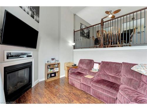 B-500 Grey Street, Brantford, ON - Indoor Photo Showing Living Room With Fireplace