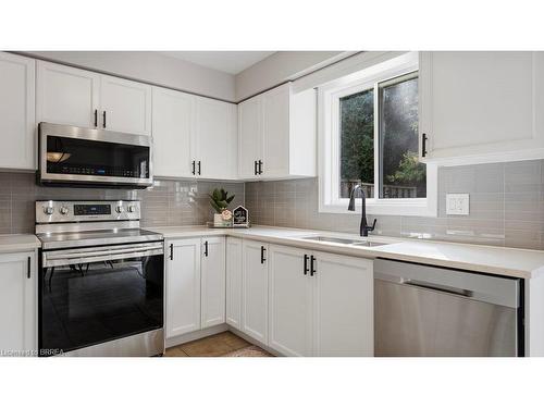 5-7 Southside Place, Hamilton, ON - Indoor Photo Showing Kitchen With Stainless Steel Kitchen With Double Sink