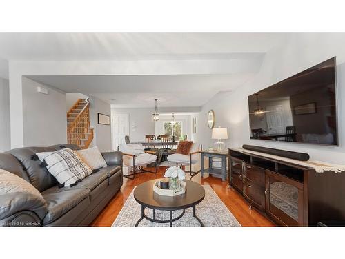 5-7 Southside Place, Hamilton, ON - Indoor Photo Showing Living Room