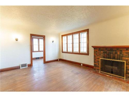 319 Cockshutt Road, Brantford, ON - Indoor Photo Showing Other Room With Fireplace