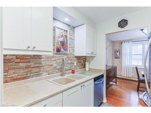 206-400 Champlain Boulevard, Cambridge, ON - Indoor Photo Showing Kitchen With Double Sink