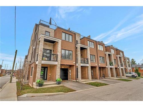 21-33 Jarvis Street, Brantford, ON - Outdoor With Balcony With Facade