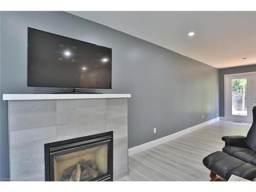 73 Milton Street, New Hamburg, ON - Indoor Photo Showing Living Room With Fireplace