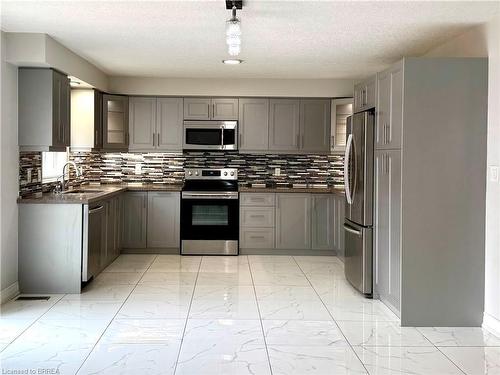 687 Spitfire Street, Woodstock, ON - Indoor Photo Showing Kitchen With Stainless Steel Kitchen With Upgraded Kitchen