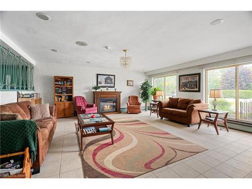 323-485 Thorold Road, Welland, ON - Indoor Photo Showing Living Room With Fireplace