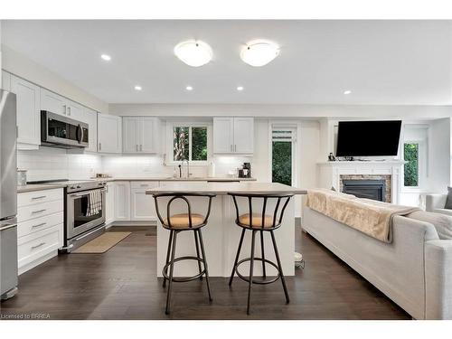 263 Owen Street, Simcoe, ON - Indoor Photo Showing Kitchen With Fireplace With Stainless Steel Kitchen With Upgraded Kitchen