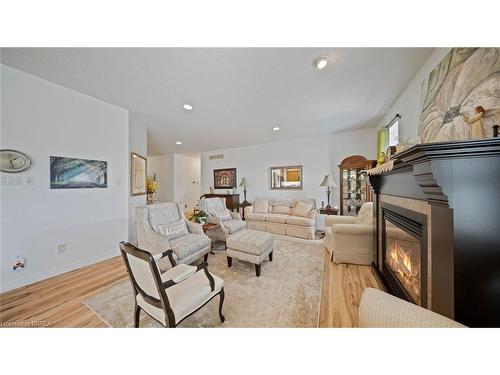 424 Lakeview Drive, Woodstock, ON - Indoor Photo Showing Living Room With Fireplace